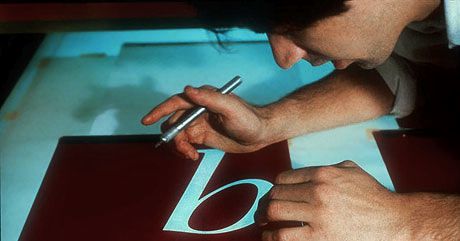 A young David Berlow cutting Rubylith